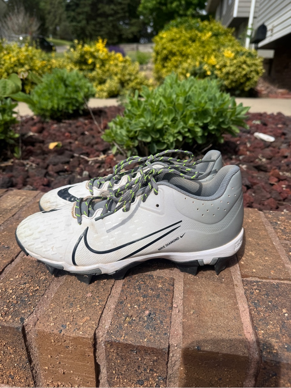 Nike Gray and Black Cleats with Lime-Accent Laces size 9 (women’s)